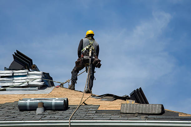 Professional Roof Replacement technician working in Mayville, NY